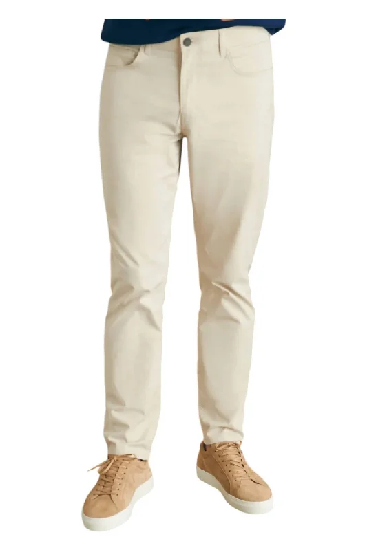 Versatile Items Movement 32" Inseam Pants In Light Sand